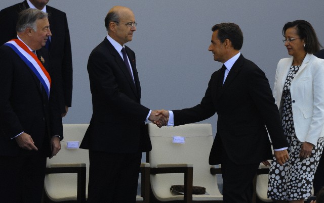 4 juillet 2011, Paris, France. Ancien ministre des affaires étrangères Alain Juppé et l’ancien Président français Nicolas Sarkozy. © Neil Marchand/Liewig Media Sports/Corbis